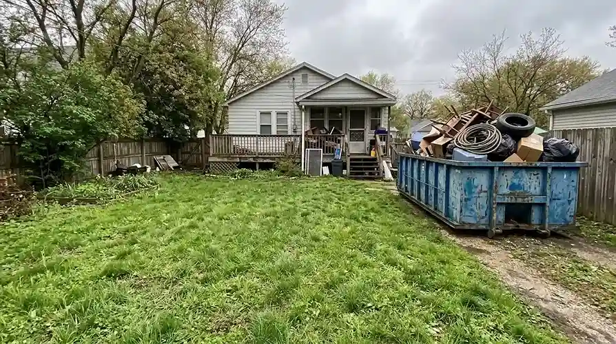 Backyard cleanout after 10 yard dumpster rental